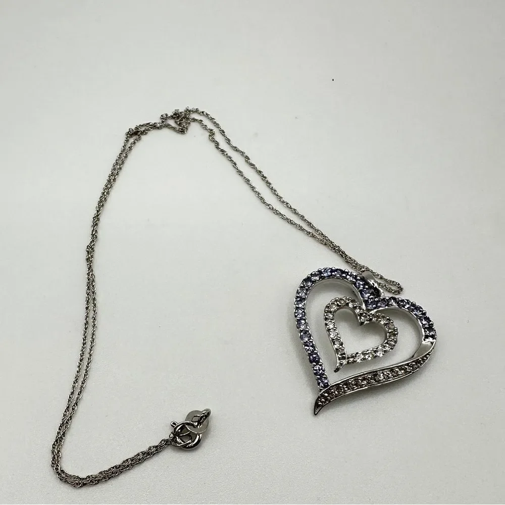 Genuine 1.5ctw tanzanite and‎ CZ accent heart necklace in sterling silver!